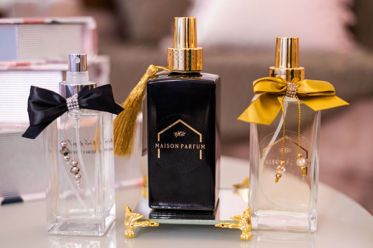 About Stylish perfume bottles showcasing elegance and luxury on decorative display
